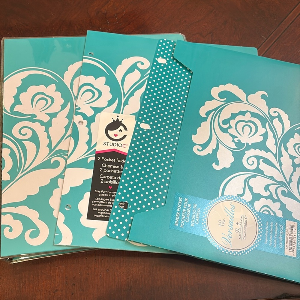 Set of one 1” binder, one 2-pocket poly folder and a poly binder pocket.